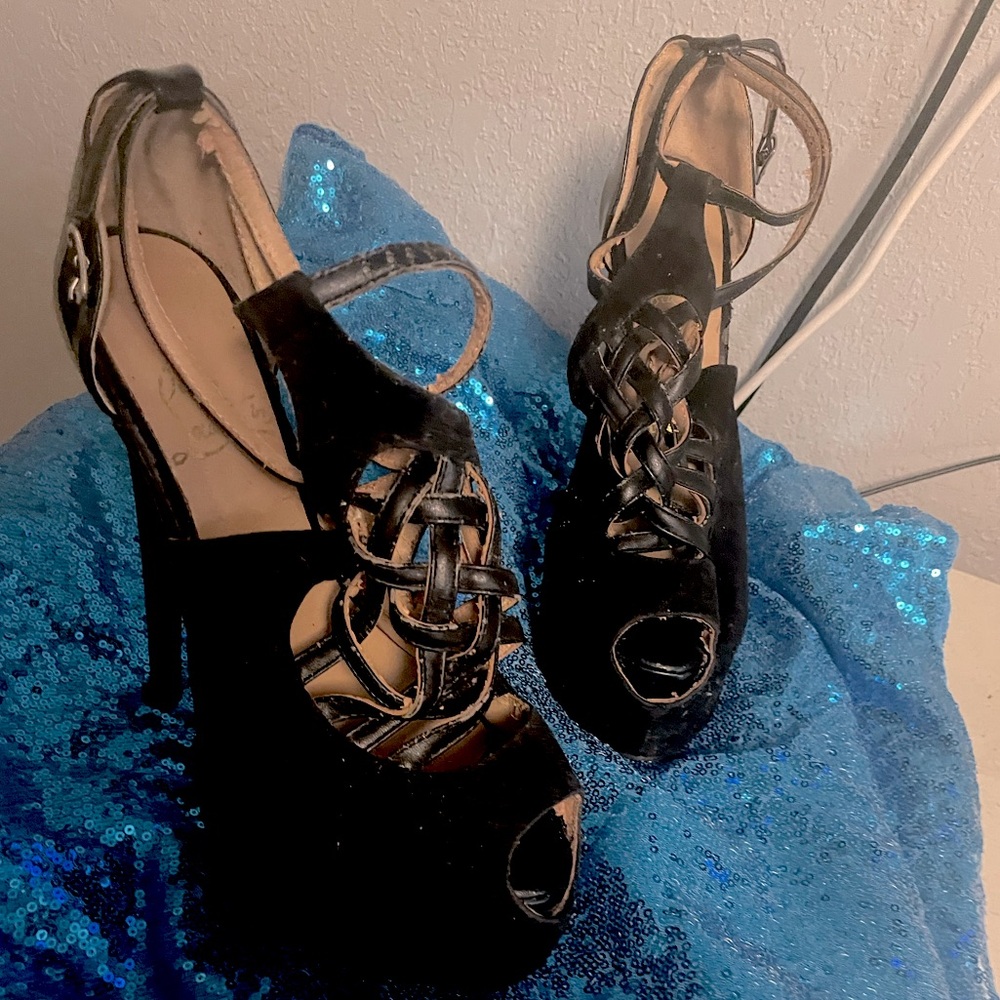 Black nice high red bottom heels if you wear anywhere from 8.5 in women to a 9